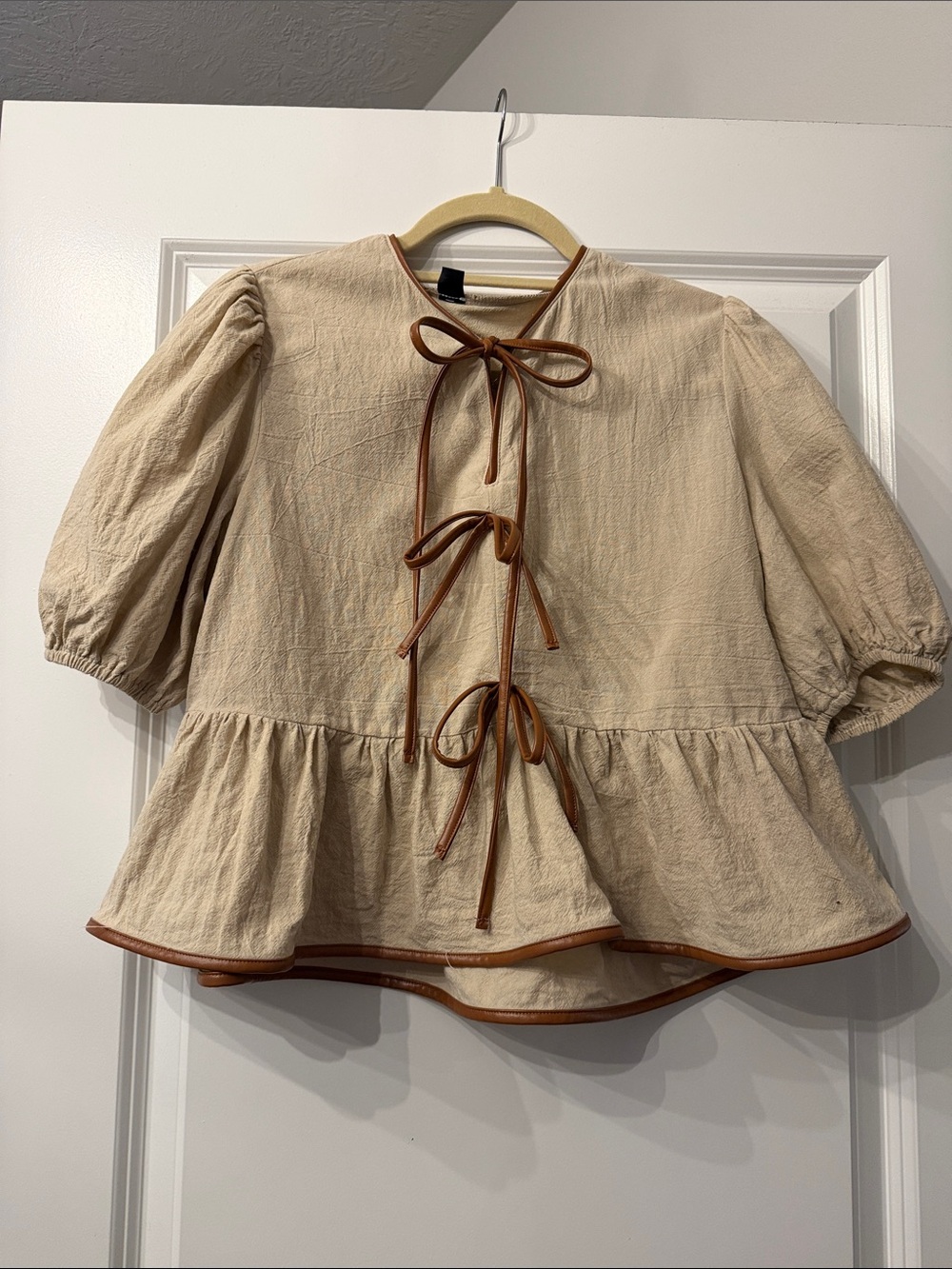 Cream Peplum Tunic Top with Brown Trim and Tie Front
